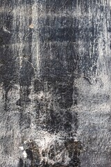 Grunge textured concrete wall with cracks in monochrome tones. Retro 90s, industrial style, raw...