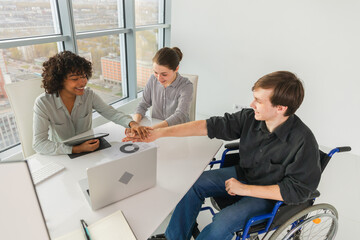 Stack of hands. Business startup teamwork unity concept. Top view of diverse multiracial business people putting hands together. Business colleagues during work process rejoice in success of company