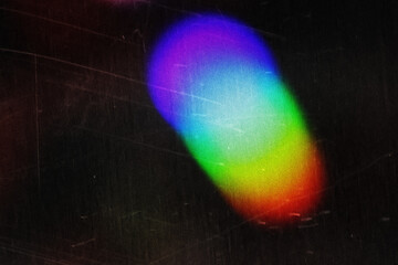 Abstract colorful light streaks create a bright rainbow glow with fiery energy and a shiny star...