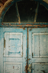 Old shabby doors in the castle