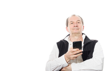 Portrait of a sixty-year-old man in a black vest.