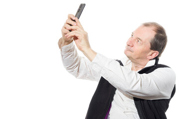 Portrait of a sixty-year-old man in a black vest.