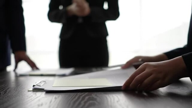 Business people, CV and interview with documents in meeting, hiring or recruiting at office. Businessman, applicant or intern applying, paperwork or resume for job, opportunity or career at workplace