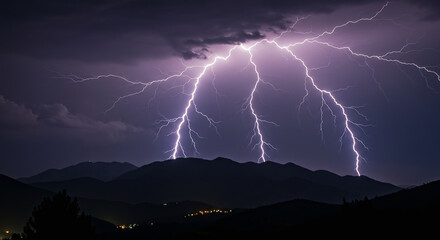 Bright forked lightning bolt illuminating the night sky