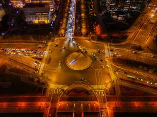 Aerial view of City Crossroads with heavy traffic in Shanghai at night.