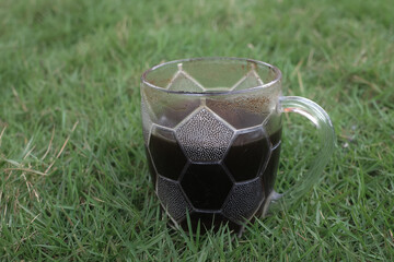 soccer ball in a cup