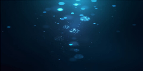 Deep blue abstract background with sparkling particles and underwater light waves