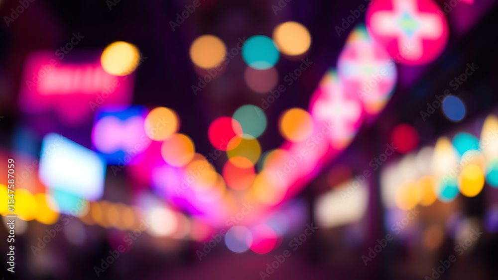 Poster a video showing vibrant blurred lights shining in darkness creating an abstract and colorful spectac