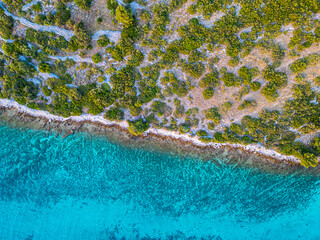 Sail boat and catamaran at a bay on blue turquoise water. Anchor in paradise