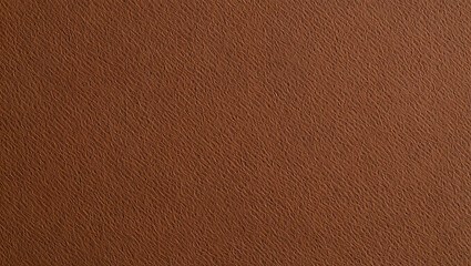 Fototapeta premium Close-up texture of brown embossed paper, showing a detailed, rough surface ideal for backgrounds, design projects, and printing applications.
