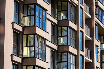 Modern luxury residential flat. Modern apartment building on a sunny day. Apartment building with a...