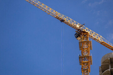 Tower Crane on formworks. Crane and building construction. Construction crane on Housing....