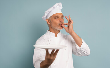 Portrait of chef, empty plate and smile, presenting menu special promo deal or restaurant product placement