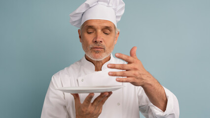 Portrait of chef, empty plate and smile, presenting menu special promo deal or restaurant product placement