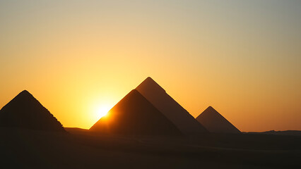 Beautiful sunset behind several pyramids in Egypt
