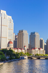 Modern apartment buildings behind a historic concession building in Tianjin, China