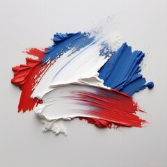 Abstract strokes of red white and blue paint on a white background creating a textured effect