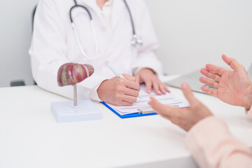 Doctor with human Liver anatomy. Elderly Patient consultation medical health for Liver cancer and Tumor, Jaundice, Viral Hepatitis, Cirrhosis, Failure, Enlarged, Hepatic Encephalopathy, Ascites Fluid