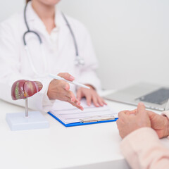 Doctor with human Liver anatomy. Elderly Patient consultation medical health for Liver cancer and Tumor, Jaundice, Viral Hepatitis, Cirrhosis, Failure, Enlarged, Hepatic Encephalopathy, Ascites Fluid