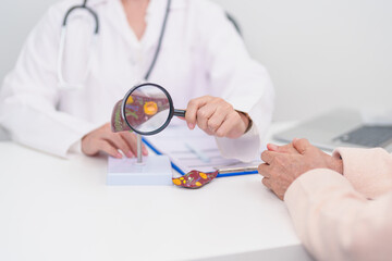 Doctor with human Liver anatomy. Elderly Patient consultation medical health for Liver cancer and Tumor, Jaundice, Viral Hepatitis, Cirrhosis, Failure, Enlarged, Hepatic Encephalopathy, Ascites Fluid