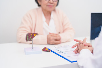 Doctor with human Liver anatomy. Elderly Patient consultation medical health for Liver cancer and Tumor, Jaundice, Viral Hepatitis, Cirrhosis, Failure, Enlarged, Hepatic Encephalopathy, Ascites Fluid