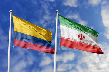 Colombia and Iran flags gracefully unfurling side by side against a brilliant blue sky,...