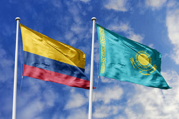 Colombian and Kazakhstani flags proudly wave together, symbolizing international relations,...