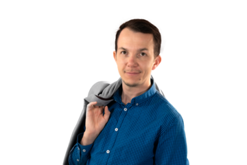 Casually dressed man holding grey blazer over shoulder while smiling confidently, representing relaxed yet professional attitude. Isolated portrait. Transparent png
