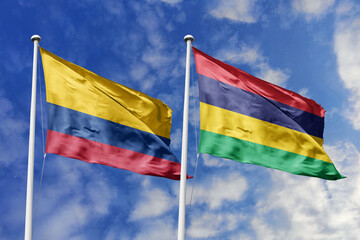 Colombian and Mauritian flags proudly wave together, symbolizing international relations, friendship, and cultural exchange.