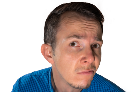 Man in blue shirt with suspicious facial expression glancing upward, conveying doubt or disbelief useful in expressive communication themes. Isolated portrait. Transparent png