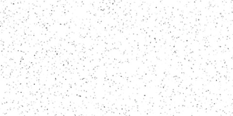 Abstract mosaic background with randomly scattered gray elements on a white surface providing textural depth and visual interest
