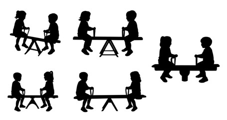 Kids playing seesaw silhouette, Little boy and girl swinging seesaw, happy, kids 