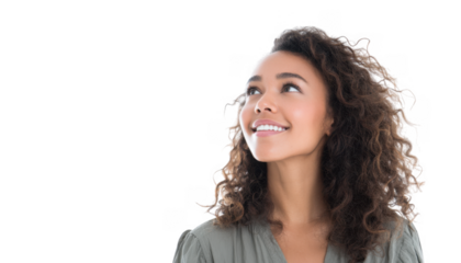 A young woman with curly hair gazes upward with a joyful expression. set against a bright white background. conveying a sense of hope and positivity. ideal for motivational themes