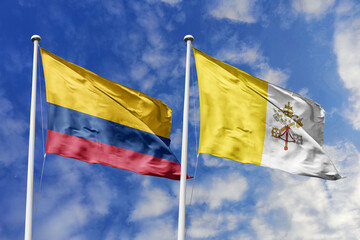The National Flags of Colombia and Vatican City Waving Together Against a Bright Blue Sky,...