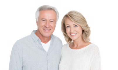 A cheerful senior couple smiles warmly at the camera. showcasing their happiness and connection. set against a clean white background that emphasizes their joyful expressions