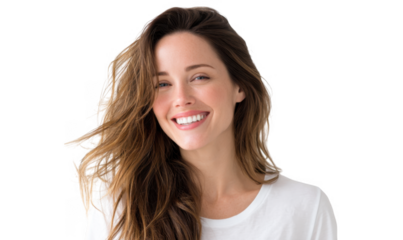 A cheerful young woman with long. flowing hair smiles warmly at the camera. set against a soft. neutral background. conveying a sense of happiness and positivity ideal for lifestyle imagery