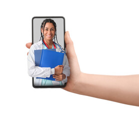 Young African-American female doctor with stethoscope and documents on white background