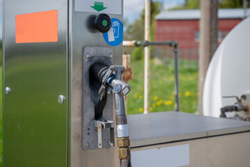 Propane gas station with large storage tank in rural countryside area 
