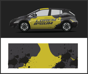 Car wrap design concept with yellow and black abstract splatter pattern