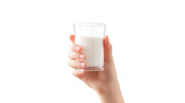 A close-up view of a hand holding a clear glass filled with fresh milk against a minimalistic white background. ideal for promoting healthy eating and beverage choices