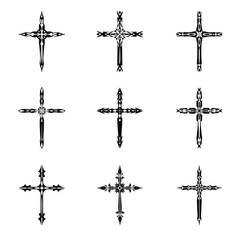 Fototapeta premium Christian cross vector icon symbols. Abstract christian religious belief or faith art illustration for orthodox or catholic design. The symbol of the cross in various designs used in tattoo.