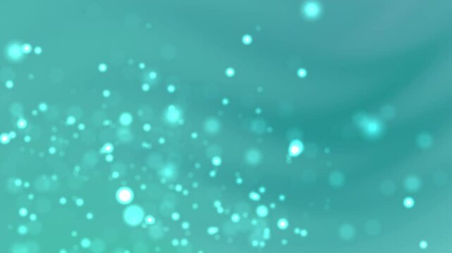 Teal bokeh sequin lights in motion create a mesmerizing effect on a turquoise blue backdrop. Ideal for use in digital design, festive, sea themed, screensaver and other glamorous projects.