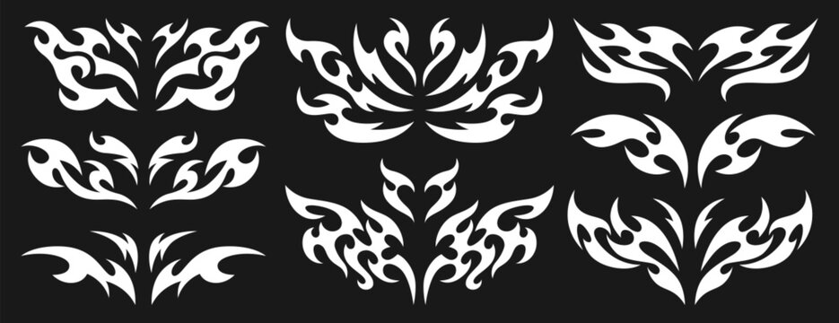 Vector set of neo tribal y2k tattoo. Neotribal dividers, symmetrical abstract shapes or cyber sigilism elements. White celtic gothic body ornaments. Emo butterfly stickers with wings and demon hearts.