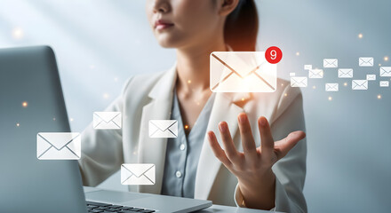 Emails with Business Woman Receiving Emails Over Laptop