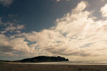 Cloudy Sky Over Beach at Hot Water Beach, New Zealand
