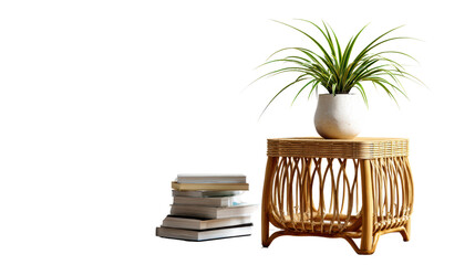 Stylish wicker side table with books and a potted plant on a white isolated background.