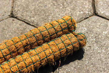 Coconut fiber trellis to help support climbing plants