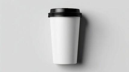 White Paper Coffee Cup with Black Lid on Light Grey Background