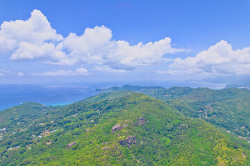 Drone shot from south east coast viewing the west to north weast coast of Mahe, turquoise water,...