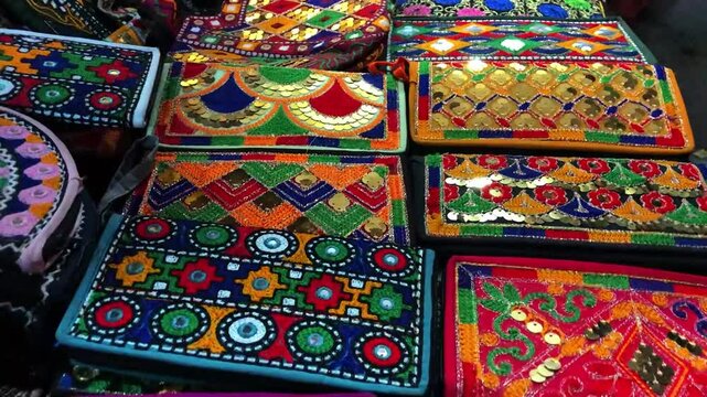 
Stack of traditional Plates and handmade ceramics, handmade colorful dishes , Handicraft kettle item, Colorful Handmade Pottery and Ceramics, Souvenir Shop in lok virsa mela Islamabad